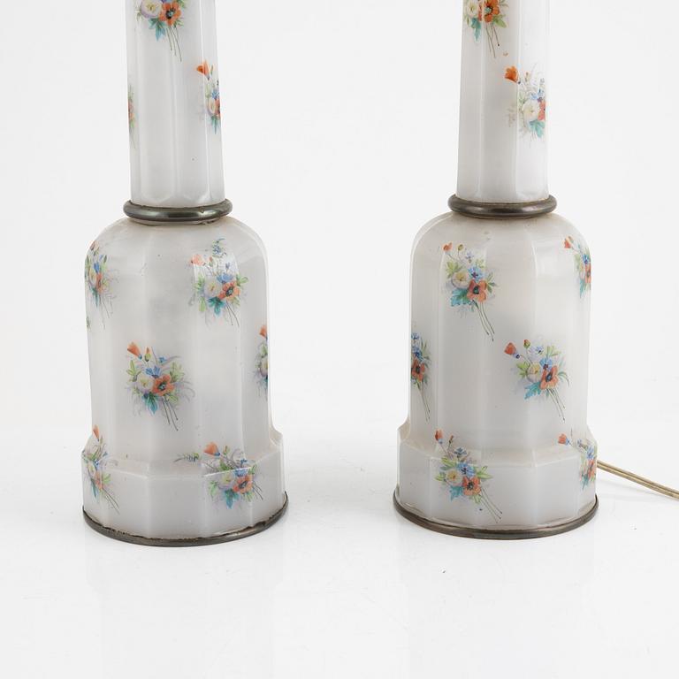 A pair of kerosene lamps, around 1900.