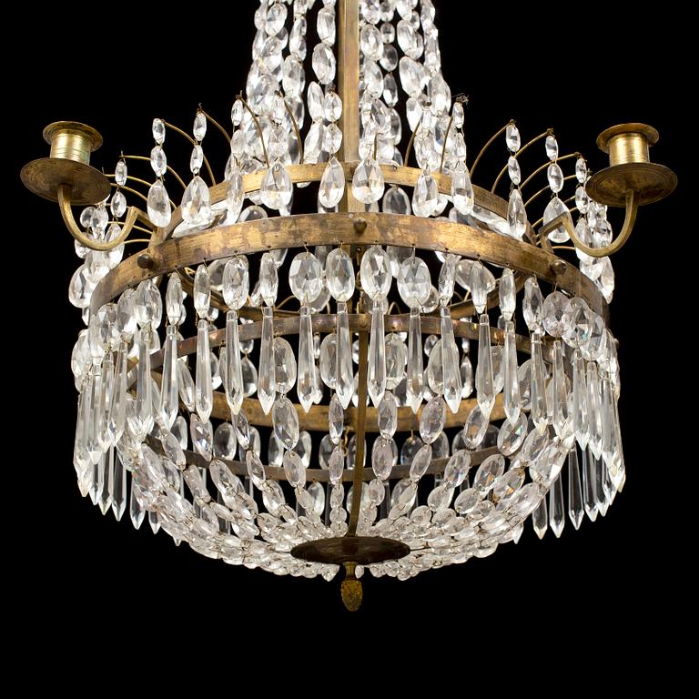 An early 20th century late gustavian style chandelier.