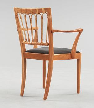 A Josef Frank mahogany and rattan armchair, Svenskt Tenn, model 1165.