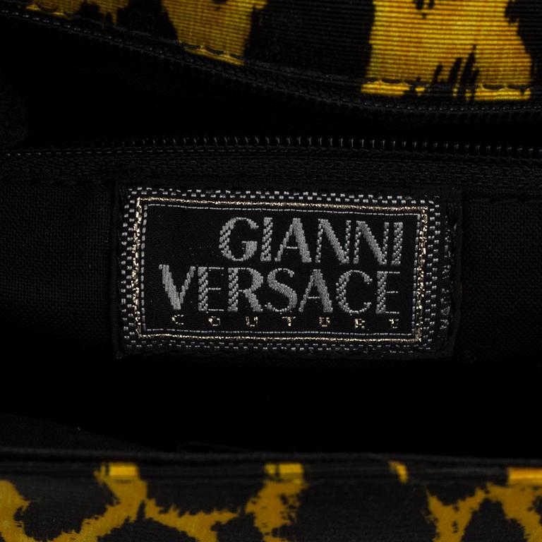 Leopard printed handbag by Gianni Versace.