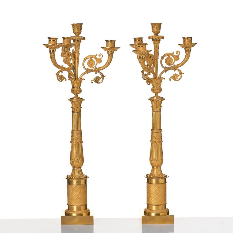 Kandelabrar, ett par, för fyra ljus, av Pierre Chibout, Paris (mästare 1806-1824), Empire.