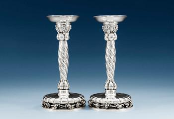 A PAIR OF GEORG JENSEN sterling candlesticks, Copenhagen 1945-77, design nr 264, Swedish import marks.