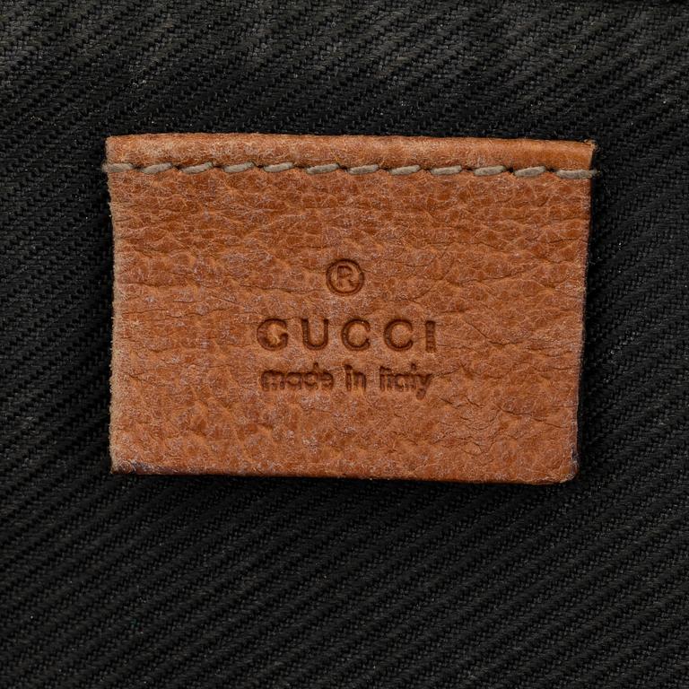Gucci, a monogram canvas bag.
