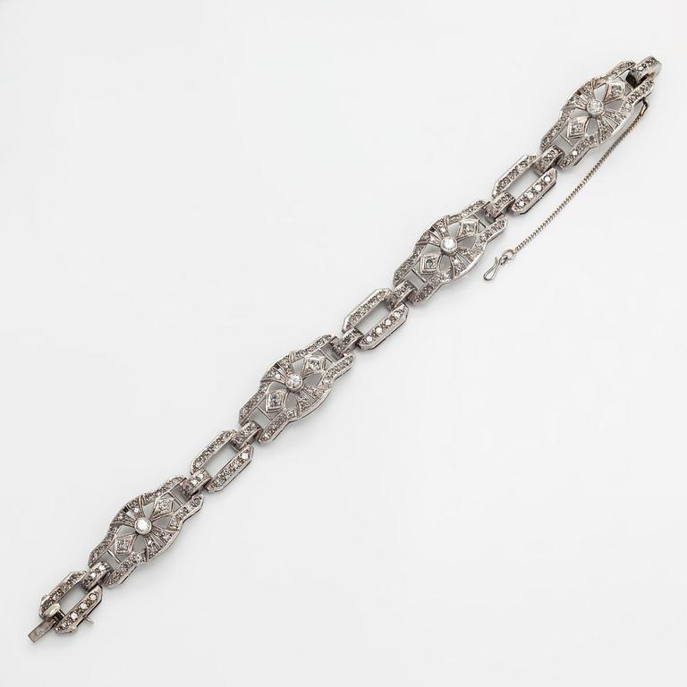 A platinum bracelet in Art deco style, with brilliant and eight-cut diamonds totalling approximately 2 ct.