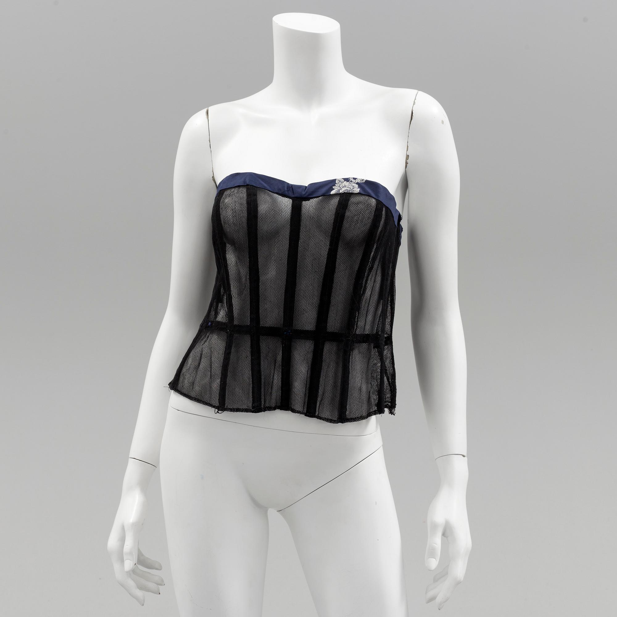 A Christian Dior 1950s midnight blue cocktail dress.