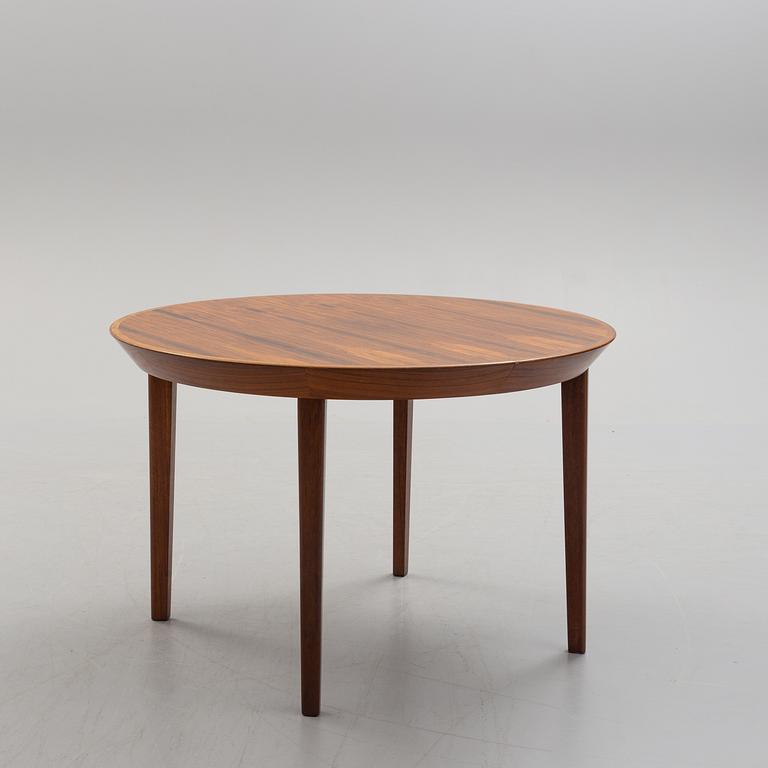 A 1950s/1960s rosewood veneer table.
