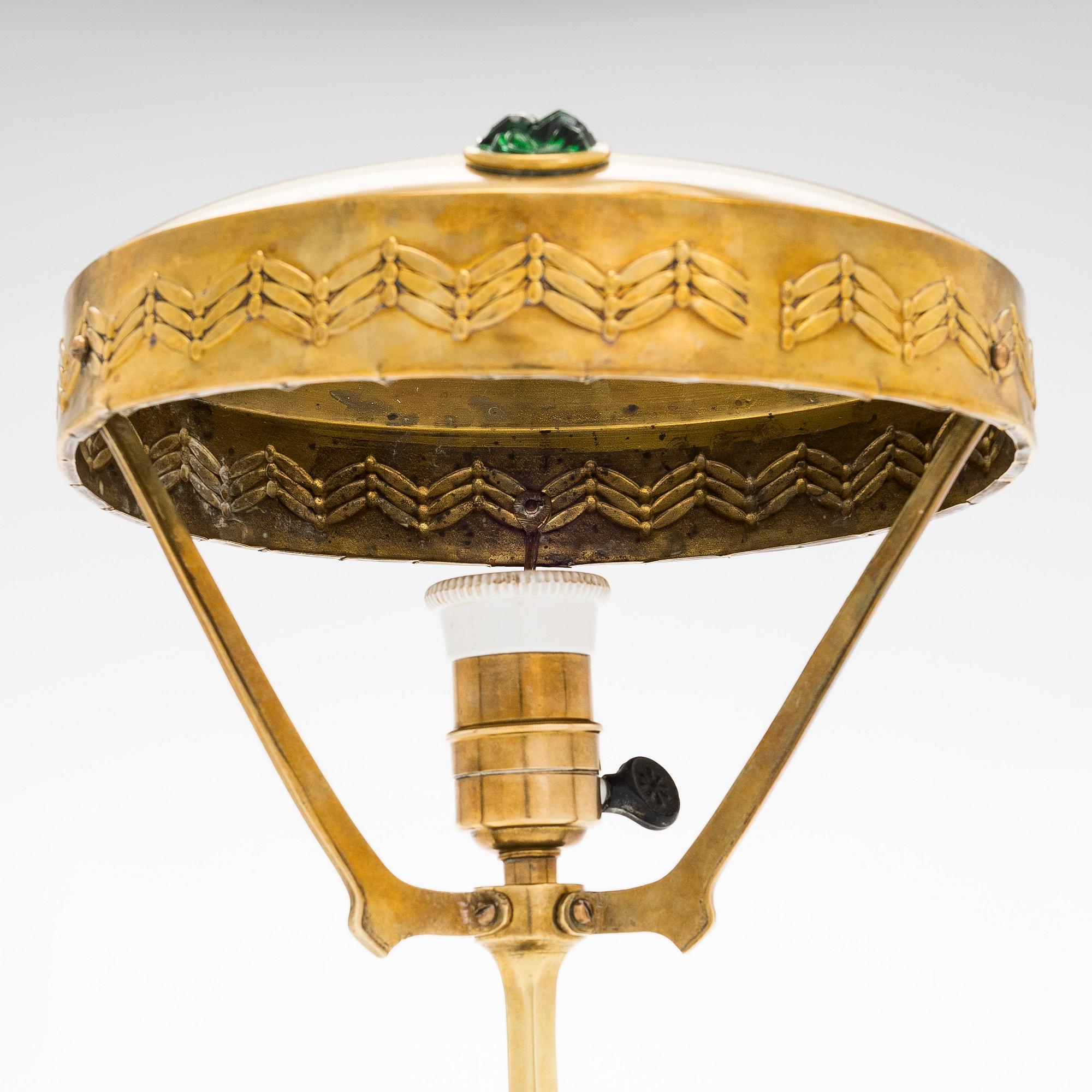 A brass table lamp, first half of the 20th century.