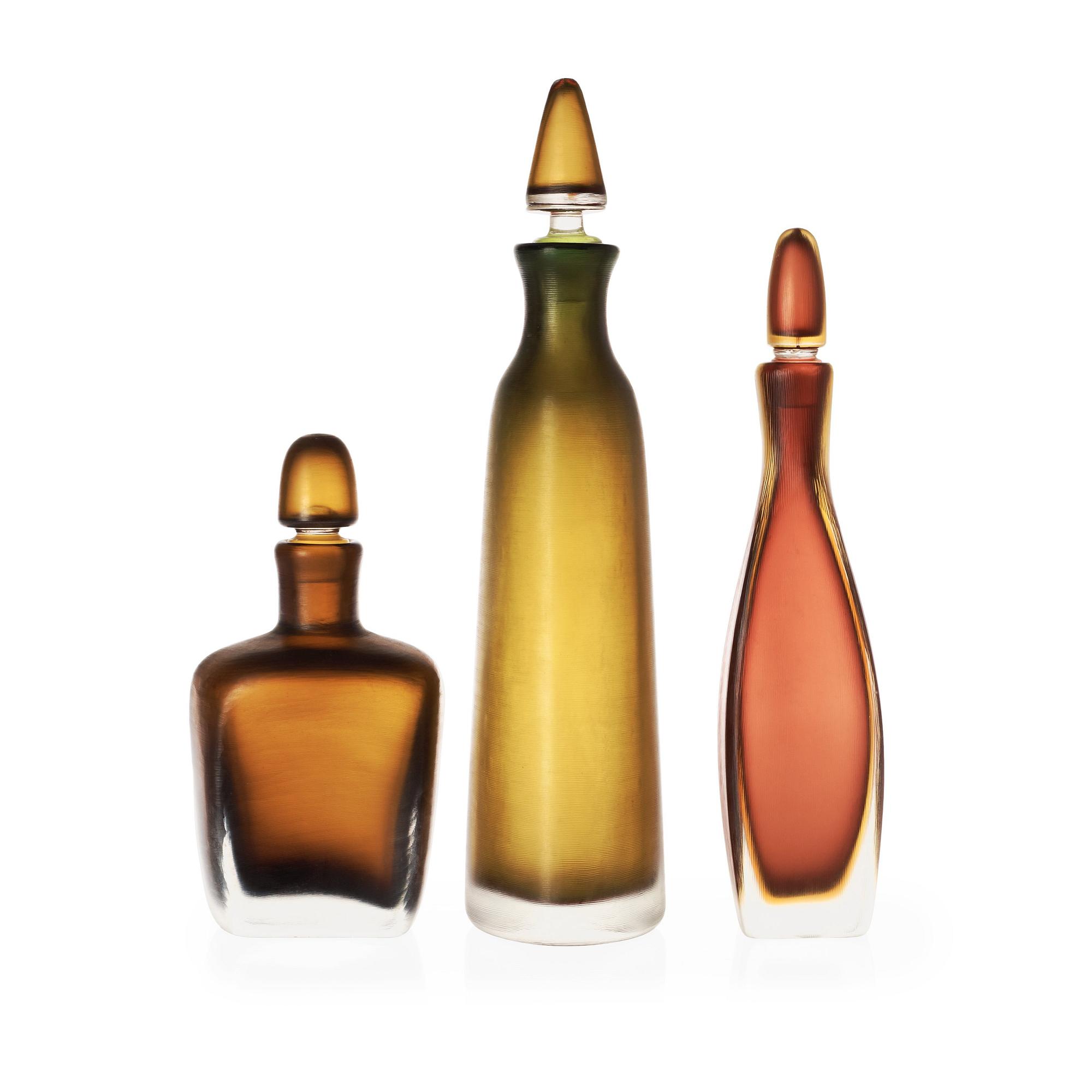 Three Paolo Venini 'Inciso' bottles, Venini, Murano, Italy, 1950's.