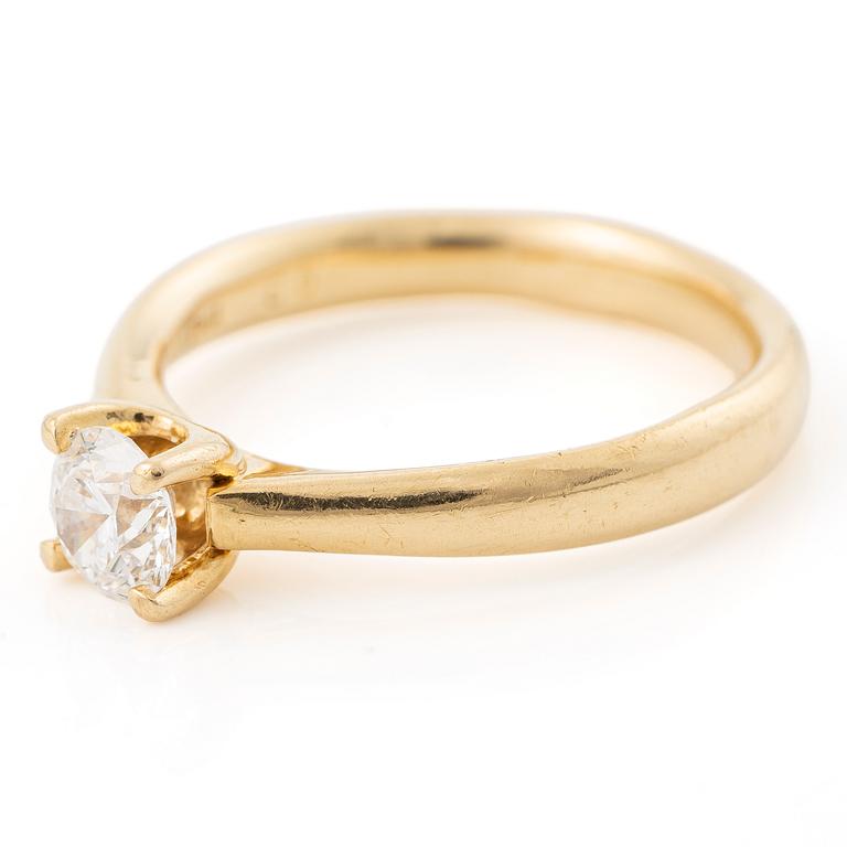 Ring, 18K gold with a brilliant-cut diamond.