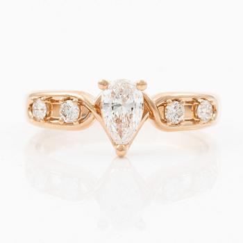 Ring 14K rose gold with a pear-shaped diamond and brilliant-cut diamonds, accompanied by an IGI report.