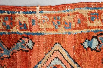 A carpet, antique Heriz, ca 334 x 271-276 cm ( ca 1-4 cm flat weave at the ends).