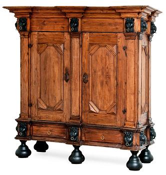 19. A BAROQUE ARMOIRE.