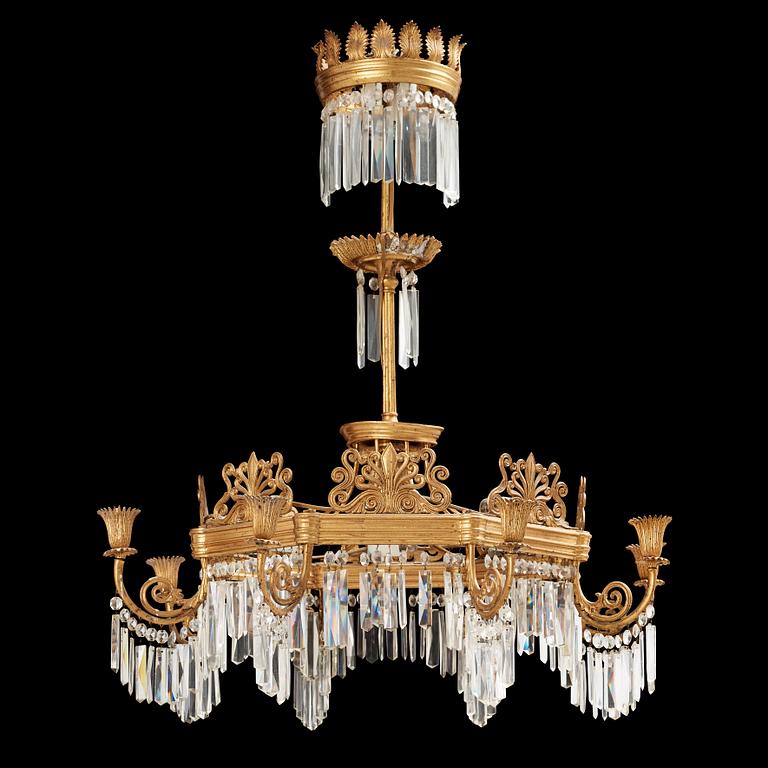 A German 19th century eight-light chandelier in the manner of Karl Friedrich Schinkel.