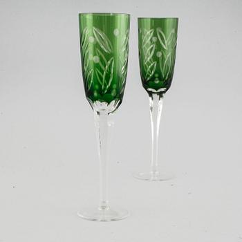 Eight champagne glasses from the 20th century.