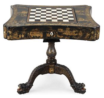 A lacquer games table. Qing dynasty, 19th Century.