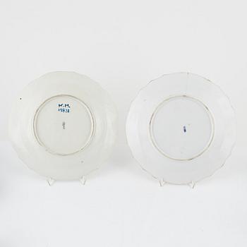Two dinner plates and 11 custard cups with covers, 18th/20th Century.