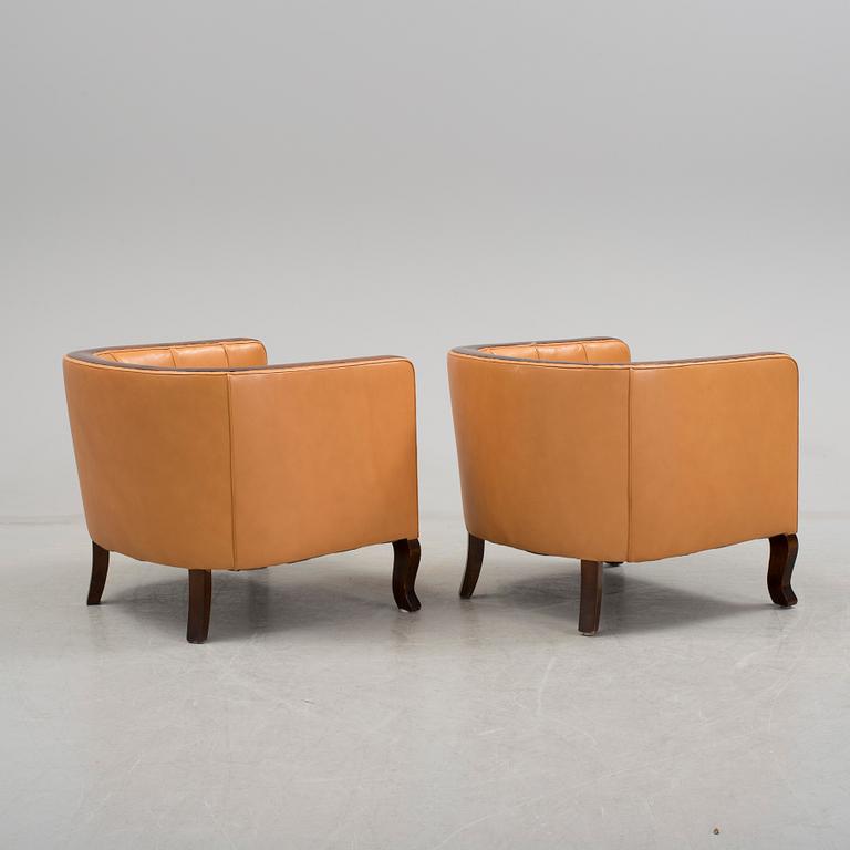 A pair of art déco lounge chairs from early 20 th century.