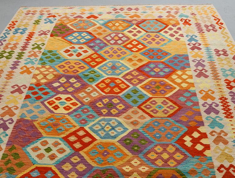 A carpet, kilim, ca 297 x 204 cm.