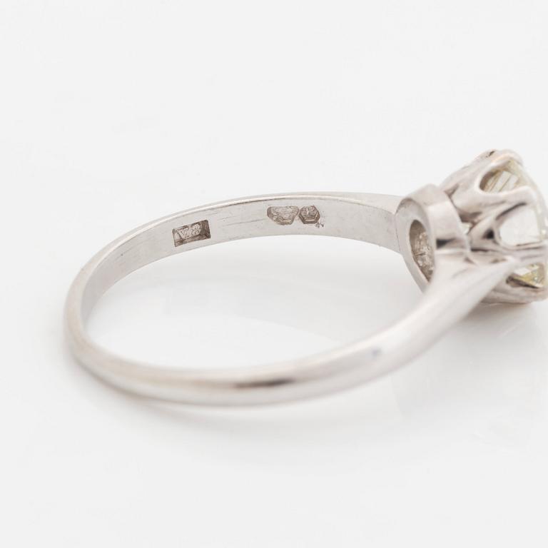 A platinum ring set with an old-cut diamond, by Wiwen Nilsson.