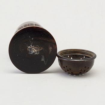 A 18th Century horn saltshaker.