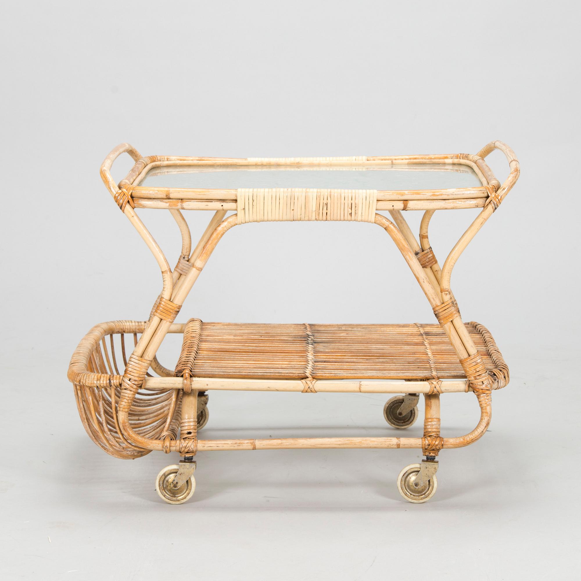 A mid 1900s bamboo and rattan serving trolley.