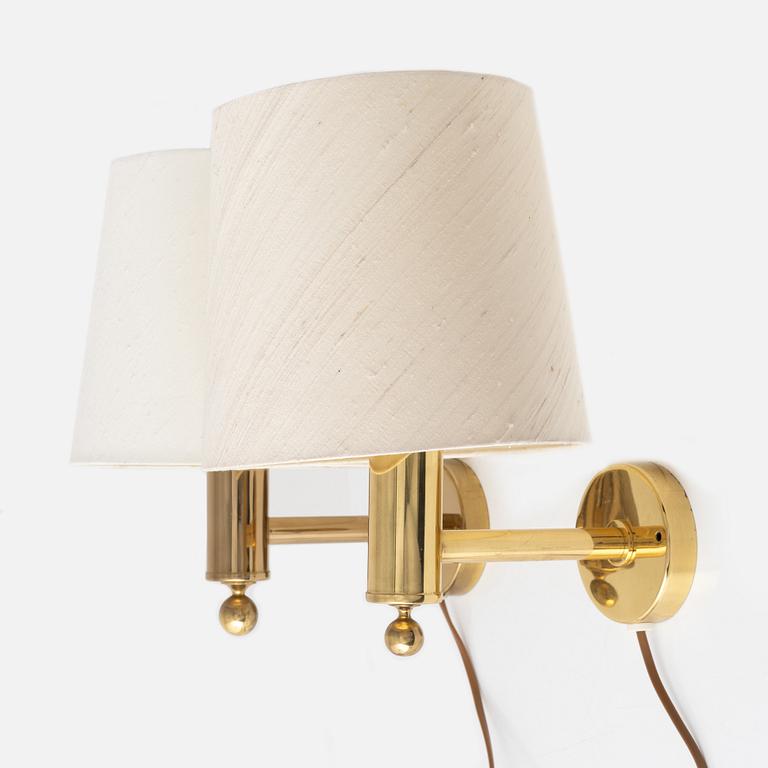 A pair of model "V-18" brass wall lamps, Bergboms, second half of the 20th century, sweden.