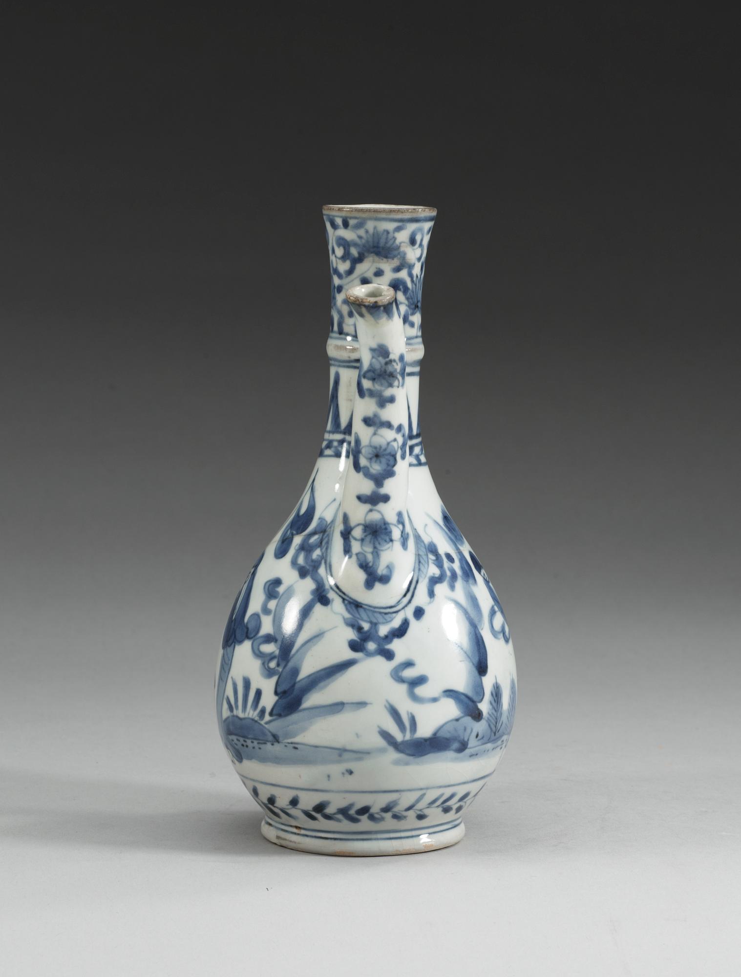 A blue and white Transitional wine ewer, 17th Century.