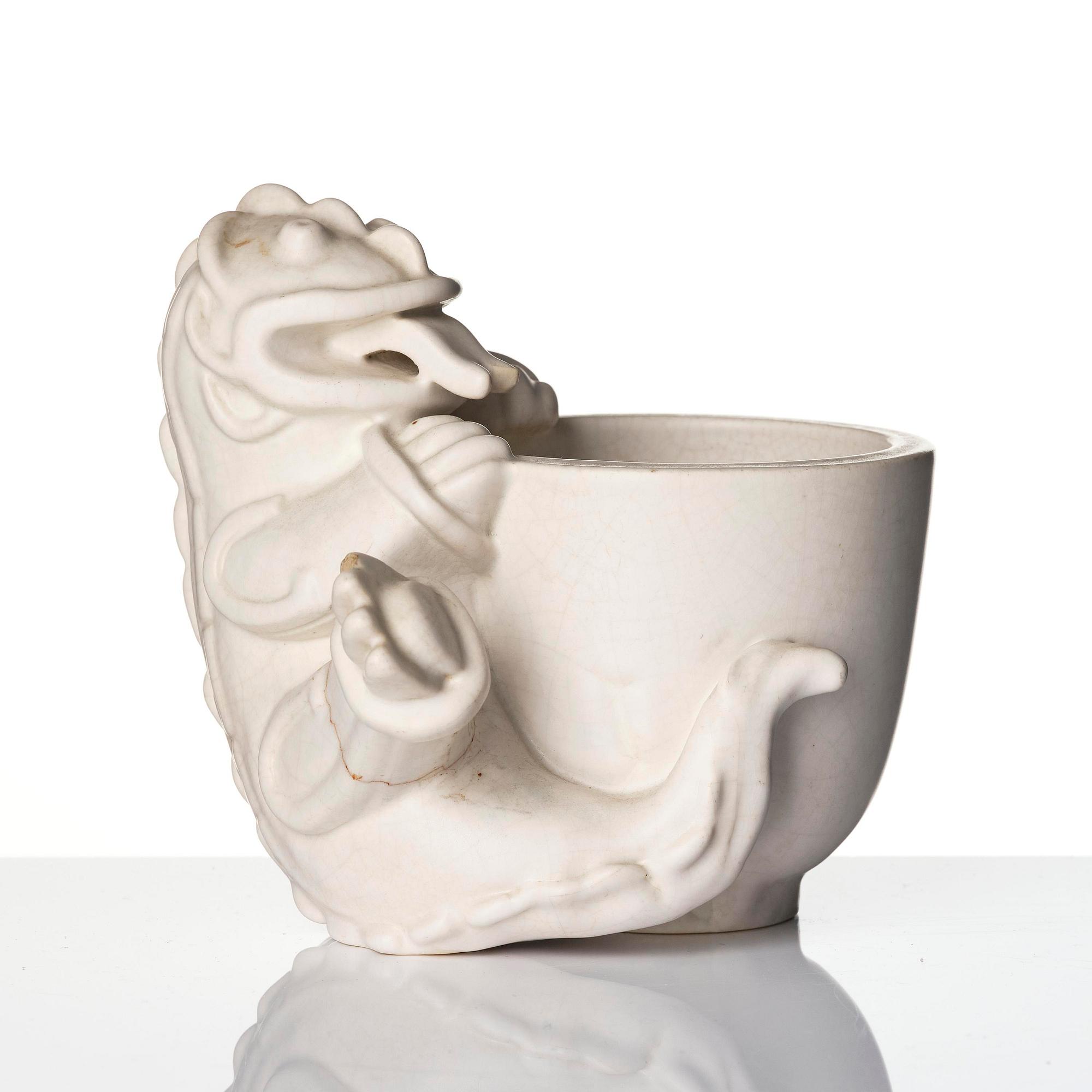 Wilhelm Kåge, a set of two stoneware sculptures of dragon puppies, Gustavsberg, Sweden 1940-50's.