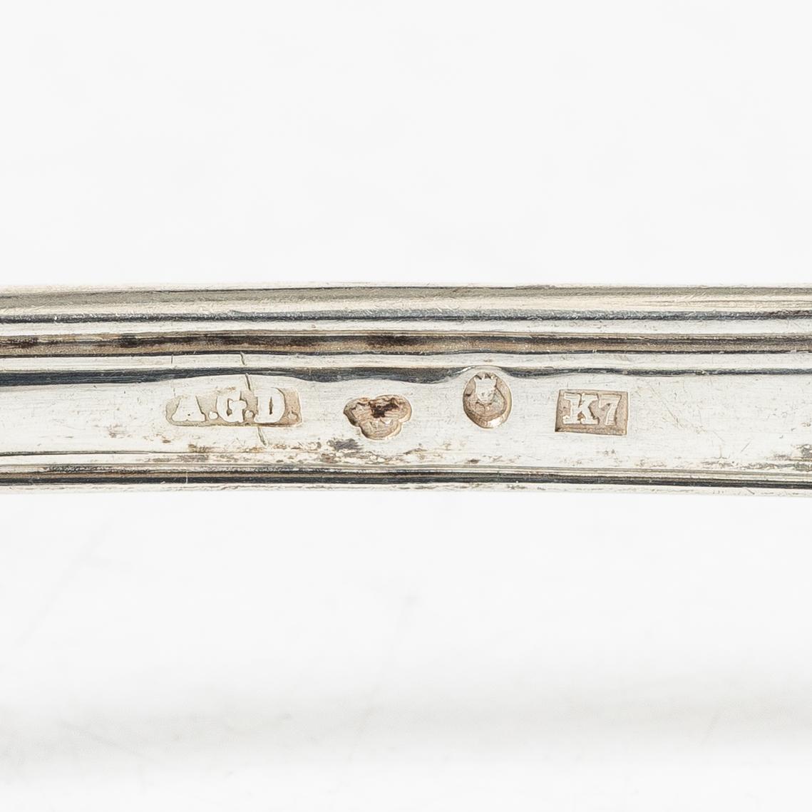 A Swedish silver cutlery service, model "Gammal fransk", including with mark of G Möllenborg, Stockholm 1907 (24 pieces).