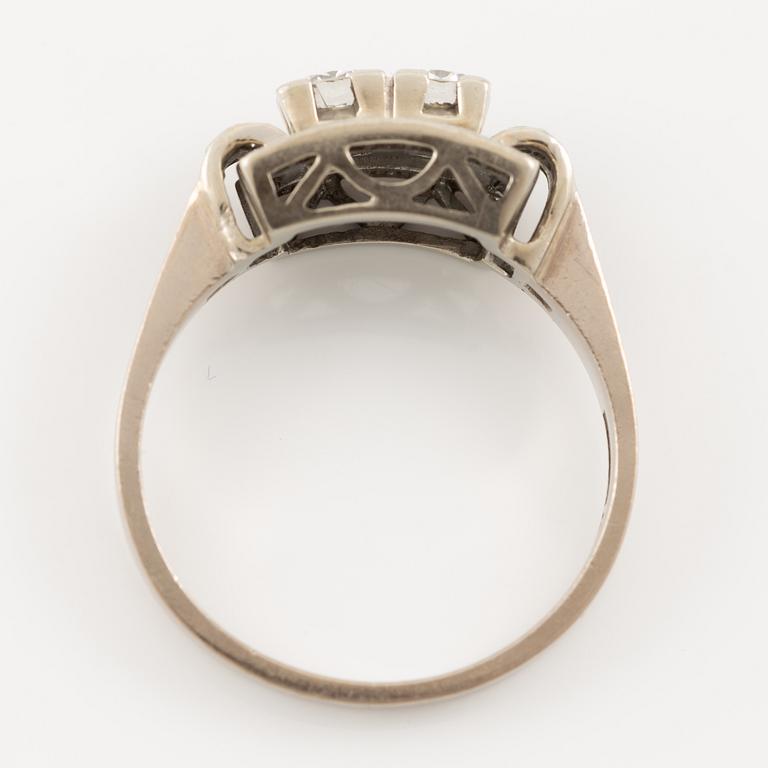 Ring in 18K white gold set with round brilliant-cut and eight-cut diamonds.