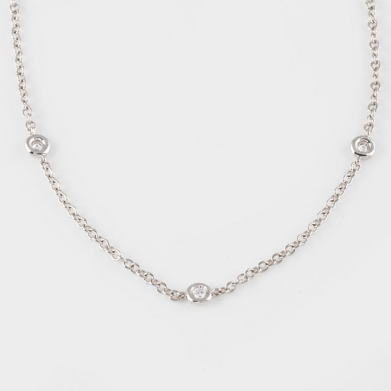 COLLIER, 18K vitguld med 12 briljantslipade diamanter ca 0.30 ct. Vikt 3,8 gram.