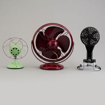 a set of three plastic and bakelite fans, mid 20th century.