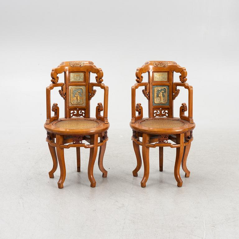 A pair of hardwood chairs,  Qing dynasty, 19th Century. Seal mark to reverse of back.