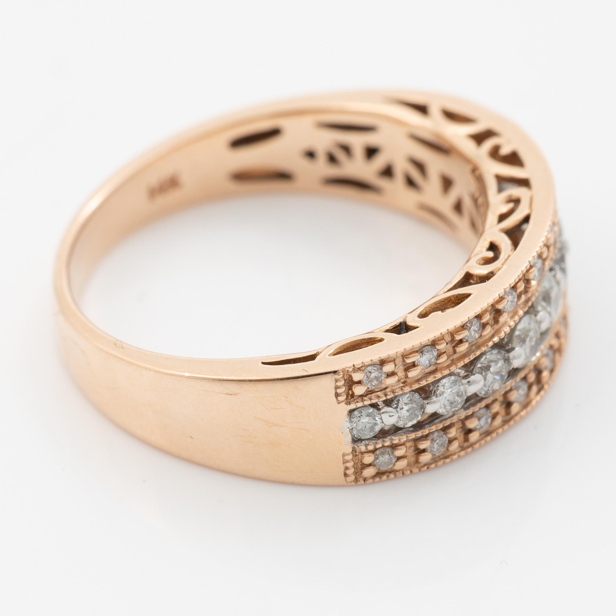 14K rose gold ring with round brilliant-cut diamonds.