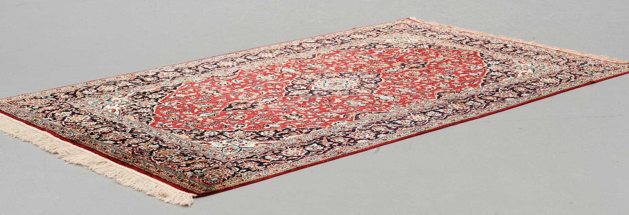 A rug, Old, silk Kashan, ca 224 x 138,5 cm.