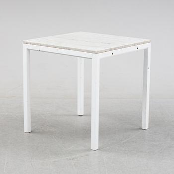 A marble top table, 21th century.