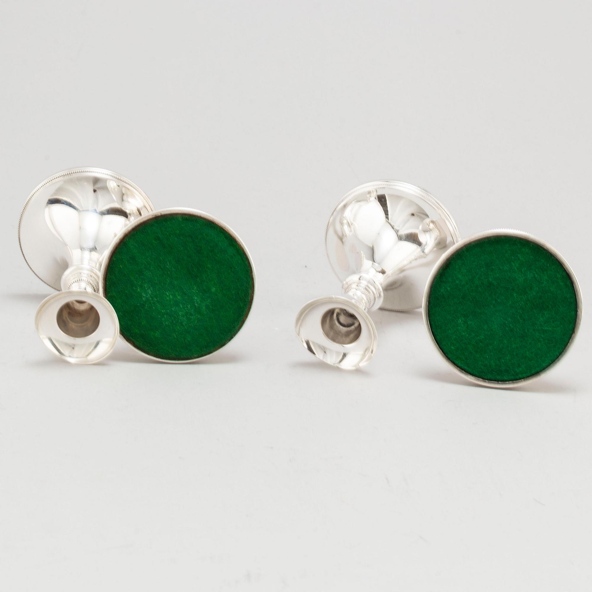 A set of four Swedish silver candlesticks, maker's mark Erik Löfman, Uppsala 1971-1973.