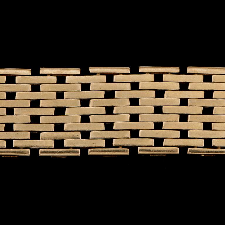 ARMBAND, 18 k guld, 1962. Vikt ca 33 g.