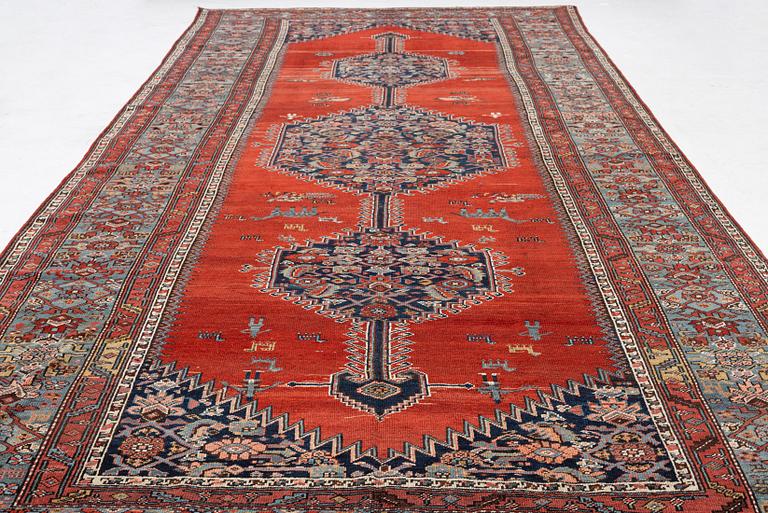 A Malayer runner, west Persia, c. 560 x 200 cm.