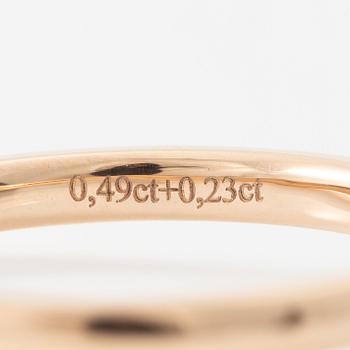 Ring 18K guld med briljantslipad diamant. Medföljande IGI report.