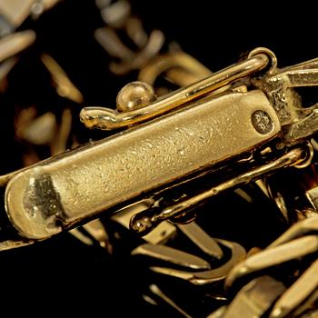 HALSLÄNK, 18k guld och vitguld, importstämplat. Vikt 53 g.