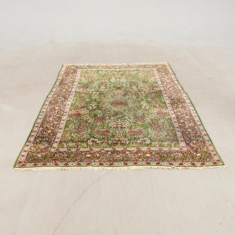 Semi-antique signed oriental rug, approximately 254x149 cm.