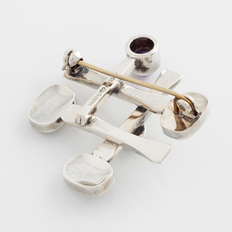 Arvo Saarela, brooch, silver with cabochon-cut amethysts.