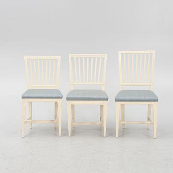 A matched set of 11 painted chairs 18th and 19th century.