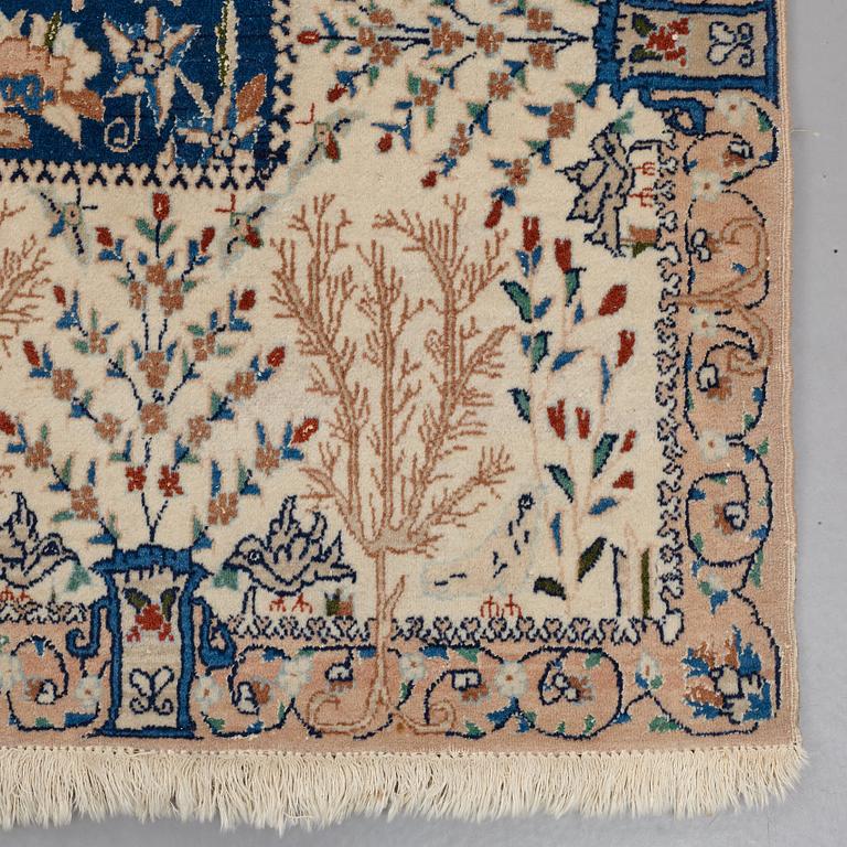 A CARPET, a semi-antique/old Nain, ca 267 x 163,5 cm.