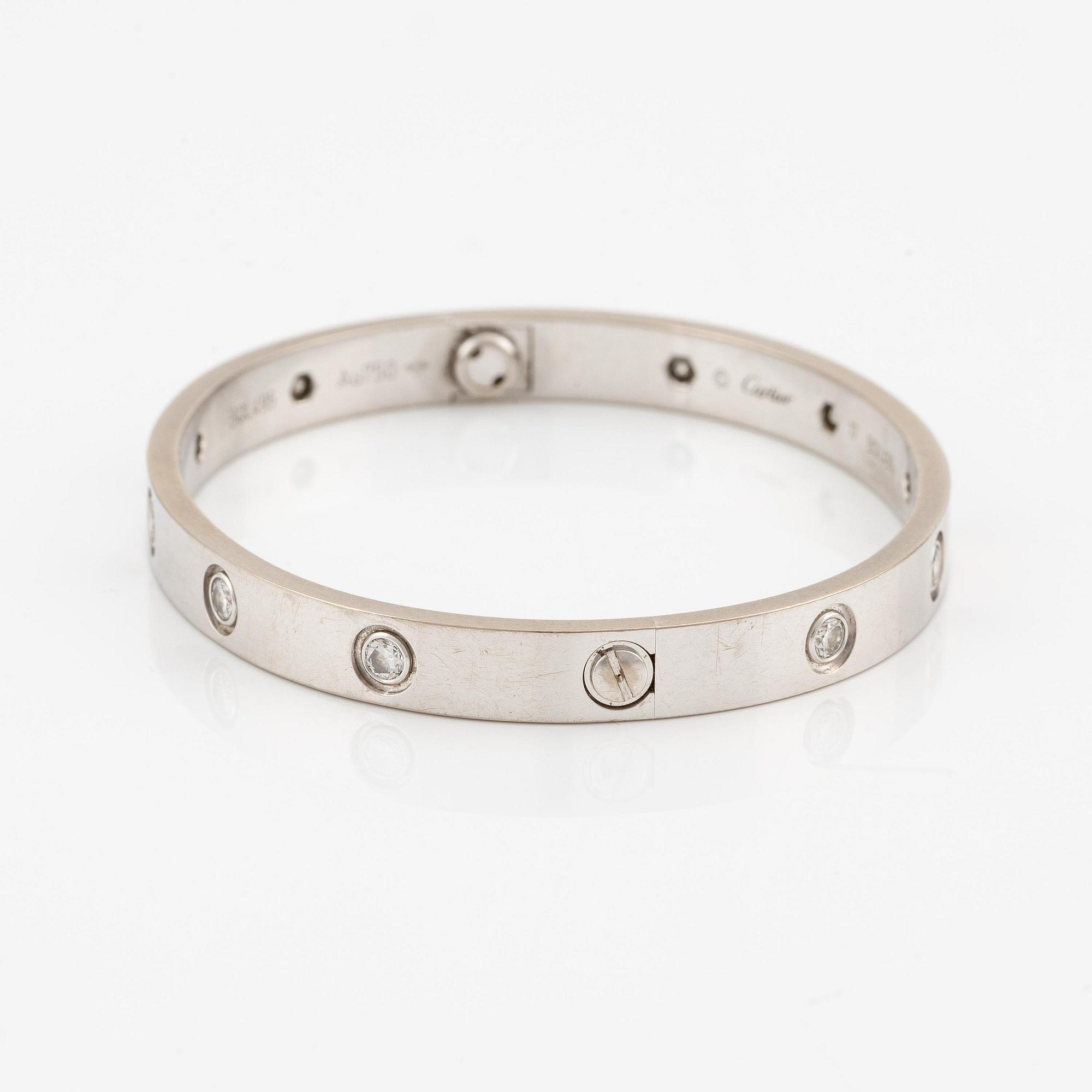 Cartier armband " Love" 18K vitguld med tio runda briljantslipade diamanter.