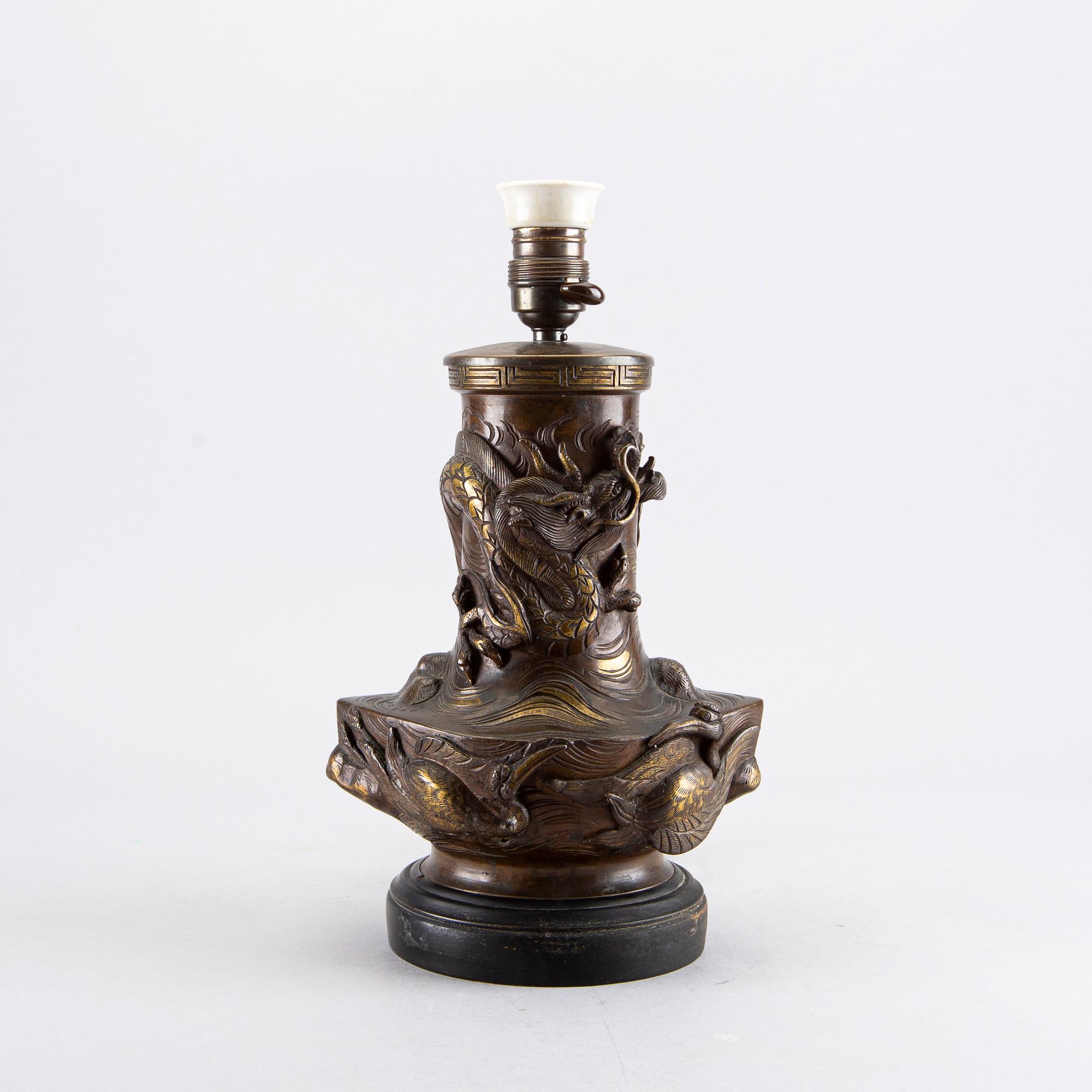 An early 1900's Japanese bronze table lamp.
