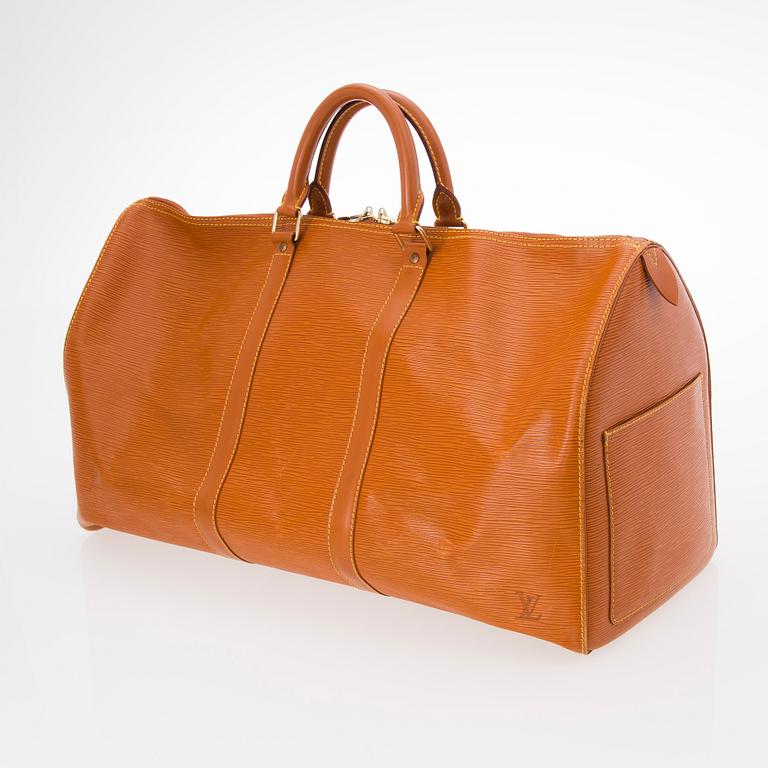 A LOUIS VUITTON CIPANGO GOLD KEEPALL 50 EPI TRAVEL BAG.