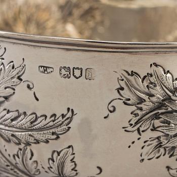 A footed silver bowl decorated with flowers, maker's mark Mappin & Webb. London 1904.