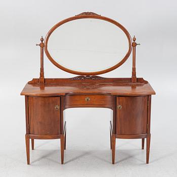 A mahogany veneered dressing table with a mirror, early 20th Century.
